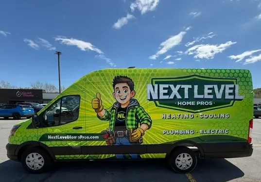 A green Next Level Home Pros van in a parking lot, featuring a cartoon handyman and text advertising heating, cooling, plumbing, and electric services.